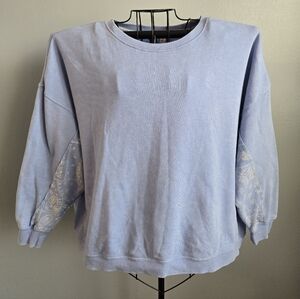 Light Blue Sweatshirt with Patterned Sleeves